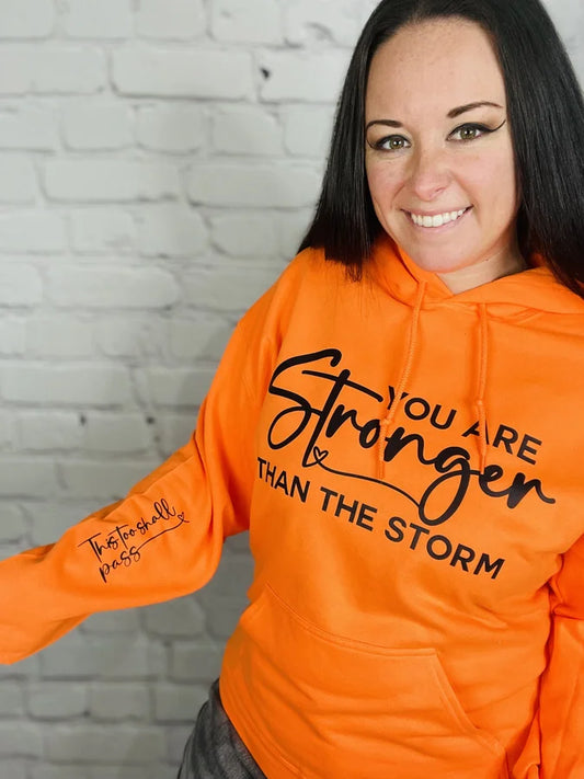 "Stronger Than The Storm" Graphic Hoodie w/ Sleeve Print